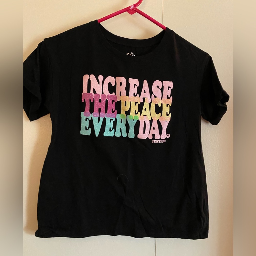 Black justice graphic tee girls size medium.